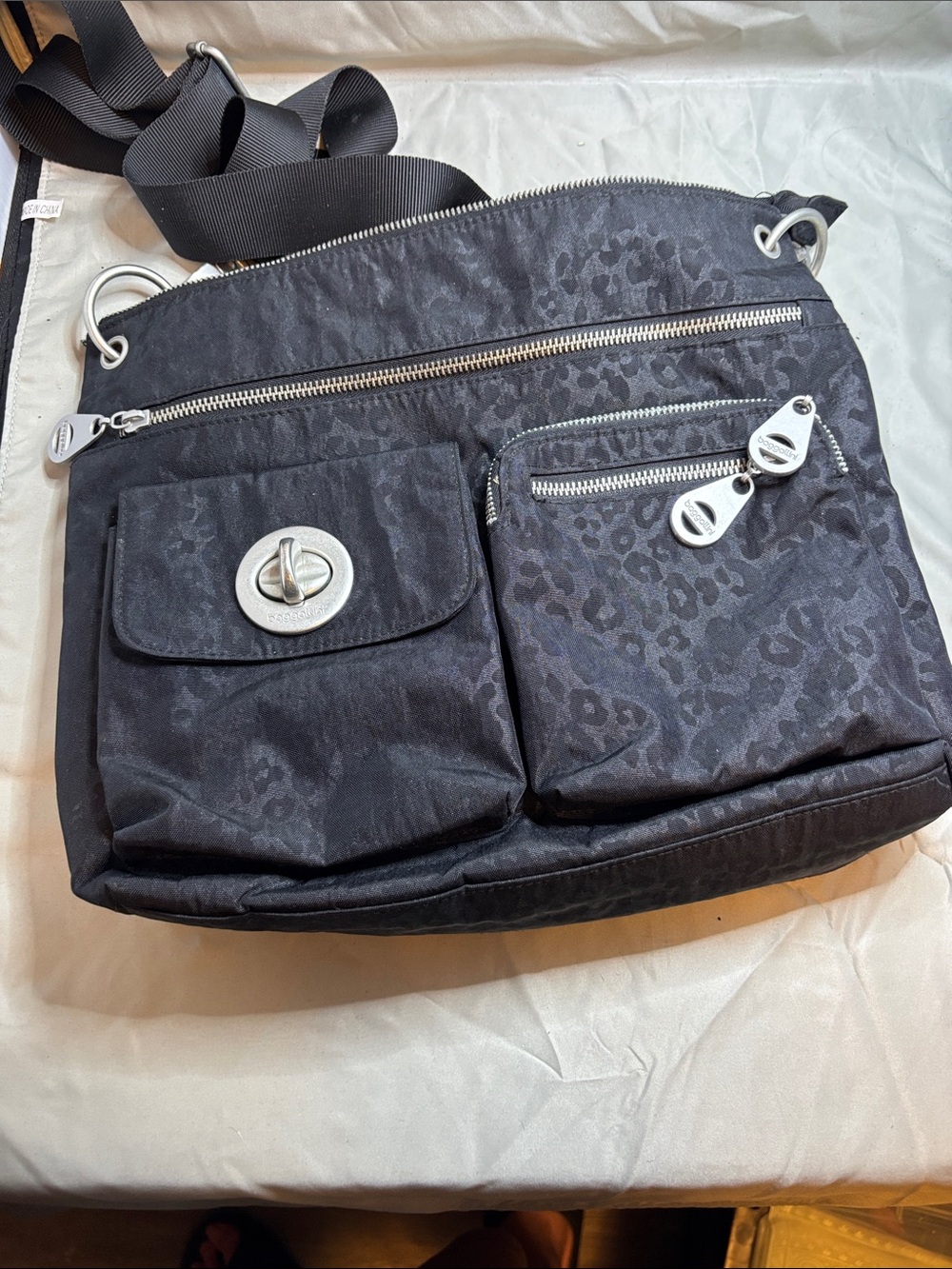 Black Leopard-Print Crossbody Bag with Multiple Pockets